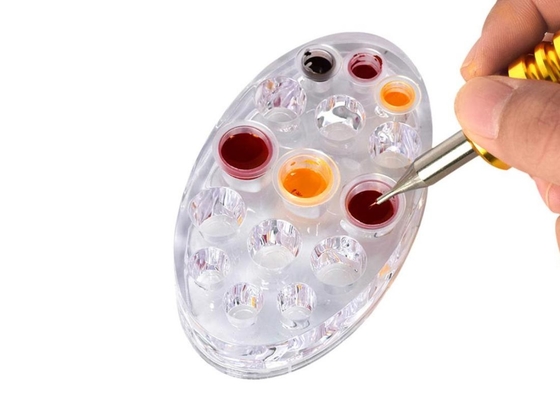 Χονδρική διαφανής ωοειδής χρωστικών ουσιών μελανιού φλυτζανιών κατόχων στάσεων επαγγελματική Makeup μηχανή ΚΑΠ δερματοστιξιών εξαρτημάτων ακρυλική